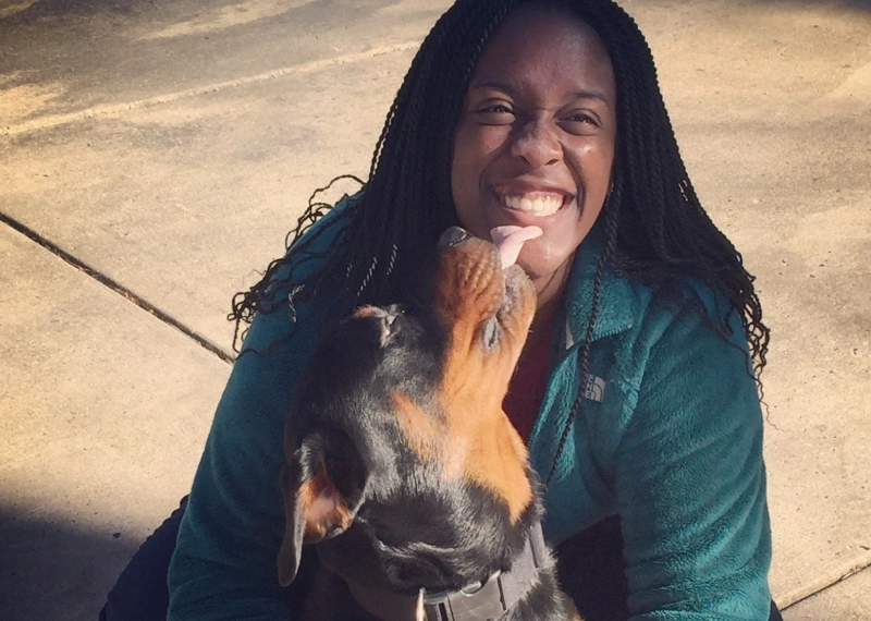 Happy owner with her Rottweiler.